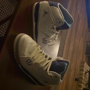 Air Jordan High Tops size 11 US. White w purple & teal. Worn twice like new